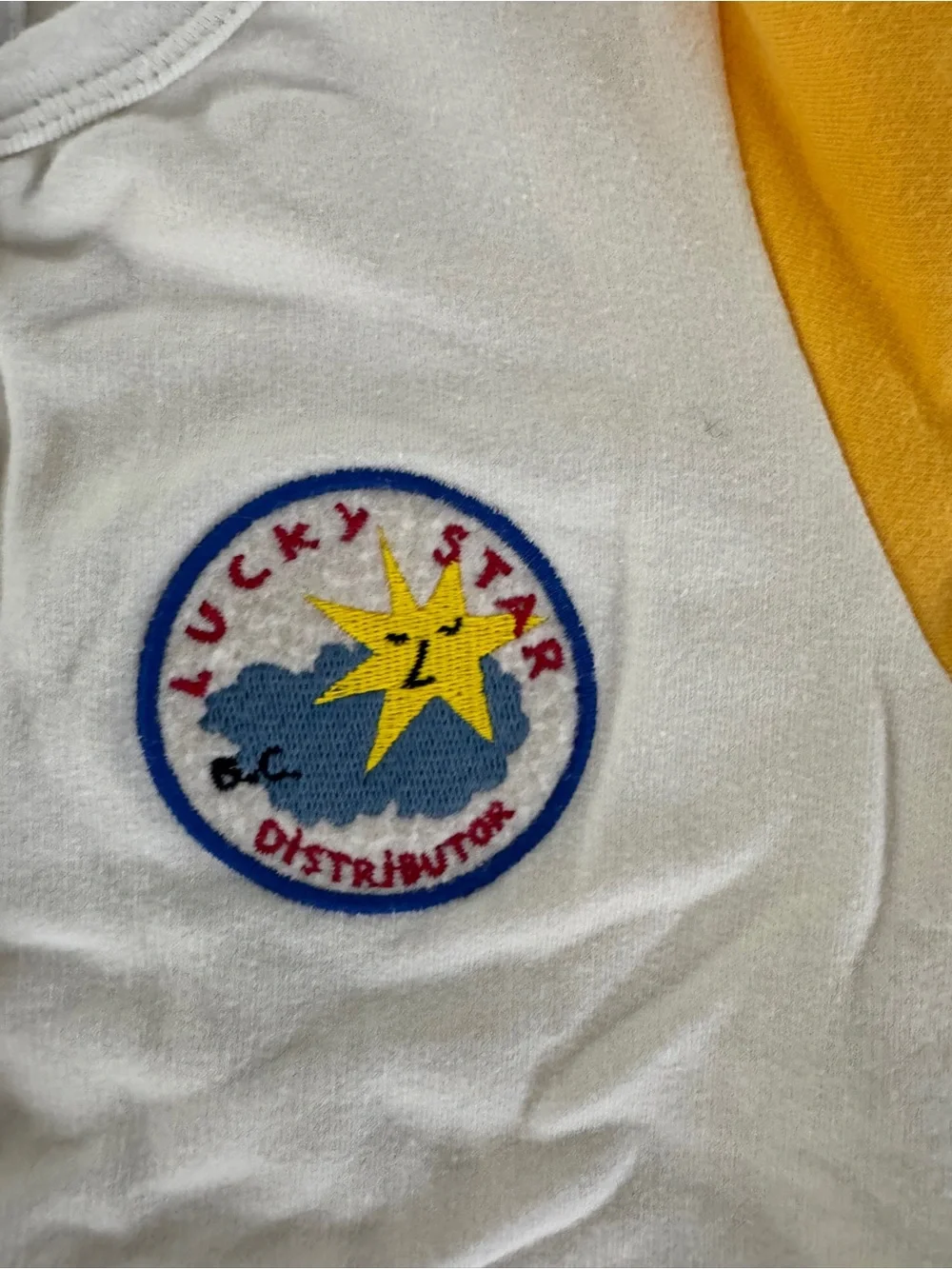 Bobo Choses Cream Footie with Yellow Sleeves and Chest Patch